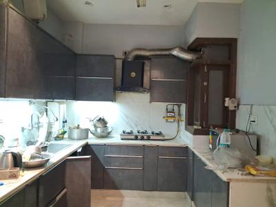 Kitchen Image of 1200 Sq.ft 3 BHK Builder Floor for sale in Ramesh Nagar New Delhi for Rs. 12500000