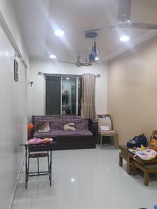 Living Room Image of 675 Sq.ft 1 BHK Apartment / Flat for sale in SP Krishna Aangan Complex, Vasan Nagar Navi Mumbai for Rs. 4500000
