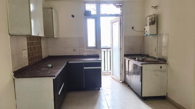 Kitchen Image of 1225 Sq.ft 3 BHK Apartment / Flat for rent in Amrapali Zodiac, Sector 120 Noida for Rs. 25000