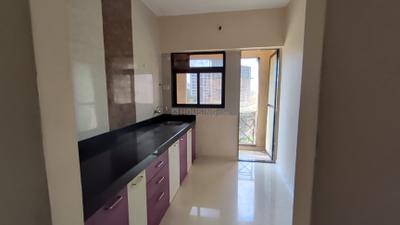 Kitchen Image of 650 Sq.ft 1 BHK Apartment / Flat for rent in Cosmos Meluha, Khidkali Thane for Rs. 12500