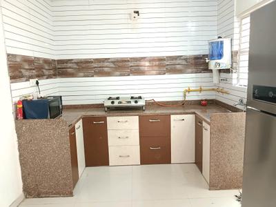 Kitchen Image of 1400 Sq.ft 3 BHK Independent House for rent in Simraj Status, Kudasan Gandhinagar for Rs. 30000