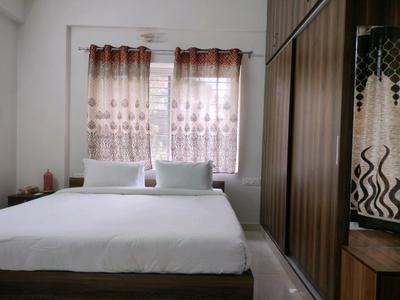 Bedroom Image of 1100 Sq.ft 2 BHK Independent House for rent in Domlur Layout Bengaluru for Rs. 80000