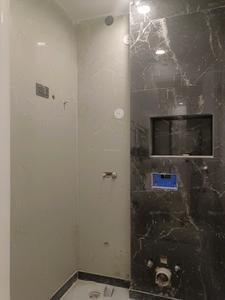 Common Bathroom Image of 1038 Sq.ft 3 BHK Apartment / Flat for sale in Sector 24 Rohini New Delhi for Rs. 8500000