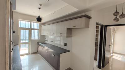 Kitchen Image of 1180 Sq.ft 2 BHK Apartment / Flat for rent in Panchsheel Wellington, Crossings Republik Ghaziabad for Rs. 22000