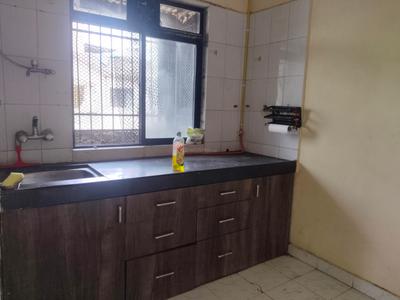 Kitchen Image of 750 Sq.ft 1 BHK Apartment / Flat for rent in  Govind Apartment, Kopar Khairane Navi Mumbai for Rs. 28000