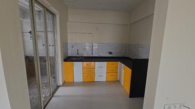 Kitchen Image of 1050 Sq.ft 2 BHK Apartment / Flat for rent in Abhinav Pebbles II E Building, Bavdhan Pune for Rs. 35000