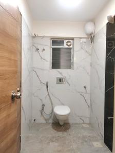 Common Bathroom Image of 1100 Sq.ft 2 BHK Apartment / Flat for sale in SMGK Woods Platina Wing B Ebony Tower, Jogeshwari West Mumbai for Rs. 25000000