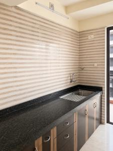 Kitchen Image of 650 Sq.ft 1 BHK Apartment / Flat for sale in Tharwani Vedant Millenia, Titwala Thane for Rs. 2300000