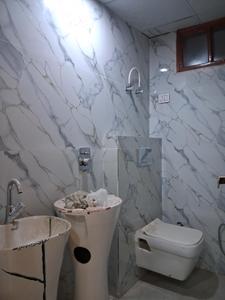 Common Bathroom Image of 1600 Sq.ft 3 BHK Apartment / Flat for sale in Sector 104 Noida for Rs. 7500000