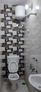 Bathroom Image of 450 Sq.ft 1 RK Builder Floor for rent in Ramesh Nagar New Delhi for Rs. 19000