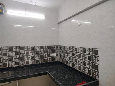 Kitchen Image of 900 Sq.ft 2 BHK Apartment / Flat for rent in Haware Dahlia Bldg A D And E, Kasarvadavali Thane for Rs. 18006