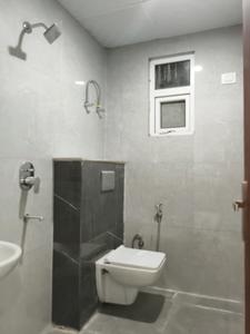 Common Bathroom Image of 1500 Sq.ft 3 BHK Apartment / Flat for sale in Noida Extension Greater Noida for Rs. 6000000