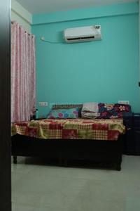 Bedroom Image of DHANKUS GIRLS PG  in Sector 16A, Noida