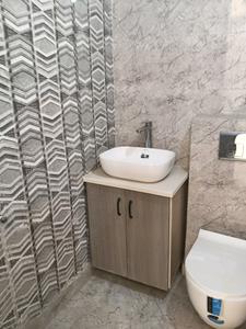 Common Bathroom Image of 1650 Sq.ft 3 BHK Apartment / Flat for sale in Suvidha Apartment, Sector 56 Gurgaon for Rs. 25000000