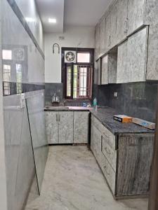 Kitchen Image of 700 Sq.ft 3 BHK Builder Floor for rent in Rohini Builder Floors, Sector 24 Rohini New Delhi for Rs. 27000