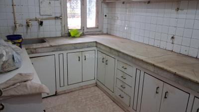 Kitchen Image of 1250 Sq.ft 3 BHK Apartment / Flat for sale in Brotherhood Apartments, Vikaspuri New Delhi for Rs. 17000000