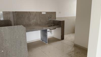 Kitchen Image of 1050 Sq.ft 2 BHK Apartment / Flat for sale in Percept Bounty 4, Wadgaon Sheri Pune for Rs. 9000000