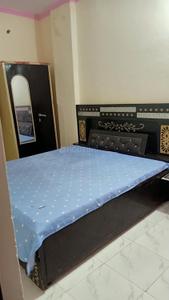 Bedroom Image of 450 Sq.ft 1 BHK Builder Floor for rent in Dwarka Mor New Delhi for Rs. 11000