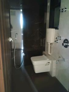 Common Bathroom Image of 600 Sq.ft 1 BHK Apartment / Flat for sale in MS Vrindavan City Building A And B, Ambivli Thane for Rs. 2999000