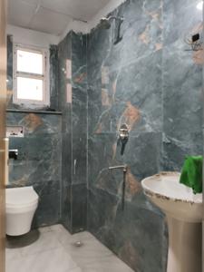 Common Bathroom Image of 1600 Sq.ft 3 BHK Apartment / Flat for sale in Sam Regency, Noida Extension Greater Noida for Rs. 6000000