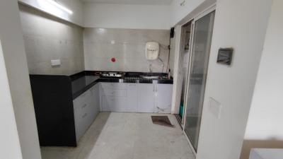 Kitchen Image of 911 Sq.ft 2 BHK Apartment / Flat for sale in Rama Melange Residences, Hinjawadi Phase 3 Pune for Rs. 7400000