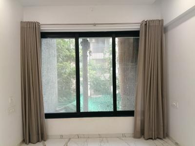Living Room Image of 748 Sq.ft 1 BHK Apartment / Flat for sale in Chheda Avighna Building No 4, Mira Road East Mira Bhayandar for Rs. 7600000