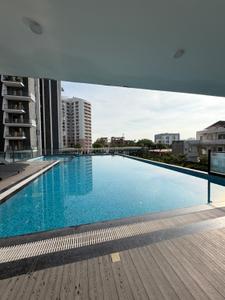 Swimming Pool Image of 1295 Sq.ft 2.5 BHK Apartment / Flat for sale in 1OAK NATURA, Sushant Golf City Lucknow for Rs. 10500000