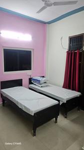 Bedroom Image of Dheeraj PG in Sector 19, Noida