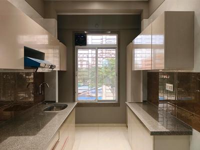 Kitchen Image of 1050 Sq.ft 2 BHK Apartment / Flat for sale in Thakurli Thane for Rs. 8800000