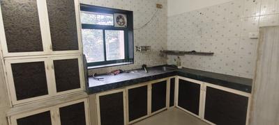 Kitchen Image of 590 Sq.ft 1 BHK Apartment / Flat for rent in  Dwarkesh Dham C H S, Dahisar West Mumbai for Rs. 30000