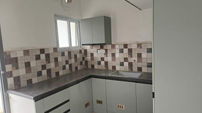 Kitchen Image of 935 Sq.ft 2 BHK Apartment / Flat for sale in Madambakkam Chennai for Rs. 7400000