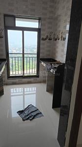 Kitchen Image of 690 Sq.ft 1 BHK Apartment / Flat for rent in Shilphata Thane for Rs. 14000
