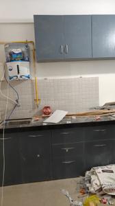 Kitchen Image of 950 Sq.ft 1 BHK Apartment / Flat for rent in Applewoods Satyesh Residency, Shela Ahmedabad for Rs. 17999
