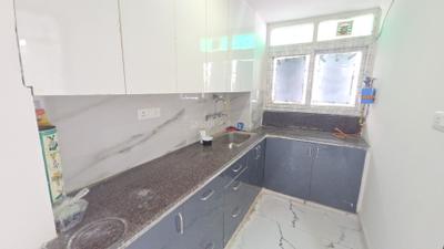 Kitchen Image of 915 Sq.ft 3 BHK Builder Floor for rent in Bharat Vihar New Delhi for Rs. 22500