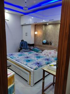 Bedroom Image of 750 Sq.ft 2 BHK Builder Floor for rent in Mansa Ram Park New Delhi for Rs. 22000
