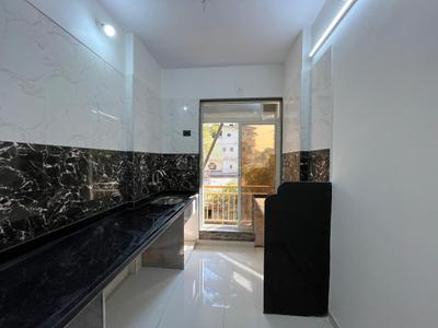 Kitchen Image of 581 Sq.ft 1 BHK Apartment / Flat for sale in Ekveera SB Tower, Dombivli East Thane for Rs. 4120000