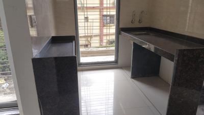 Kitchen Image of 592 Sq.ft 1 BHK Apartment / Flat for sale in Kalyan Vihar, Kalyan West Kalyan for Rs. 3200000