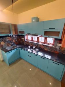 Kitchen Image of 1500 Sq.ft 4 BHK Independent House for sale in Kalarcode Alappuzha for Rs. 6999999