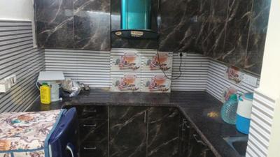Kitchen Image of 1100 Sq.ft 3 BHK Builder Floor for rent in Ramesh Nagar New Delhi for Rs. 38000