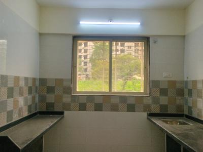 Kitchen Image of 674 Sq.ft 1 BHK Apartment / Flat for sale in Amrut Laxmi Raj Regalia Phase I, Ambernath East Ambernath for Rs. 2450000