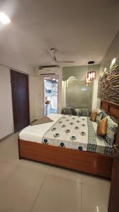 Bedroom Image of 1000 Sq.ft 2 BHK Builder Floor for rent in Sector 122 Noida for Rs. 45000