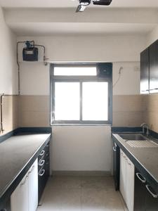 Kitchen Image of 950 Sq.ft 2 BHK Apartment / Flat for sale in Raunak Unnathi Woods Phase VI F1, Kasarvadavali Thane for Rs. 9000000