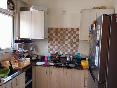 Kitchen Image of 1050 Sq.ft 2 BHK Apartment / Flat for rent in Amrapali Zodiac, Sector 120 Noida for Rs. 28000