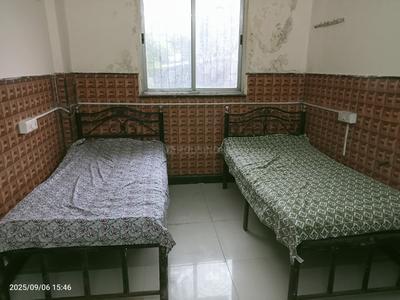 Bedroom Image of Ram PG Rooms (Mob. 7070824322) in Kopar Khairane, Navi Mumbai