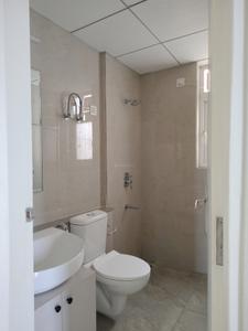 Common Bathroom One Image of 1350 Sq.ft 3 BHK Apartment / Flat for sale in Eldeco Live By The Greens Phase 1, Sector 150 Noida for Rs. 15850000