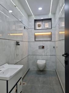 Common Bathroom Image of 900 Sq.ft 3 BHK Apartment / Flat for sale in Dwarka Mor New Delhi for Rs. 7500000