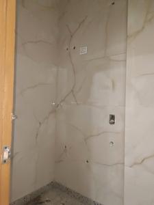 Common Bathroom Image of 550 Sq.ft 2 BHK Builder Floor for sale in Sector 4 Rohini New Delhi for Rs. 2600000
