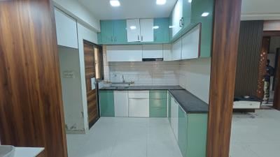 Kitchen Image of 890 Sq.ft 2 BHK Apartment / Flat for rent in Shreeji Shagun Heights, Hanspura Ahmedabad for Rs. 15000