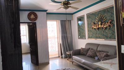 Living Room Image of 1040 Sq.ft 2 BHK Apartment / Flat for rent in Logix Blossom Greens, Sector 143 Noida for Rs. 42500