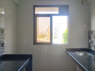 Kitchen Image of 583 Sq.ft 1 BHK Apartment / Flat for sale in Rudis Shivalaya Heights, Khidkali Thane for Rs. 3720000